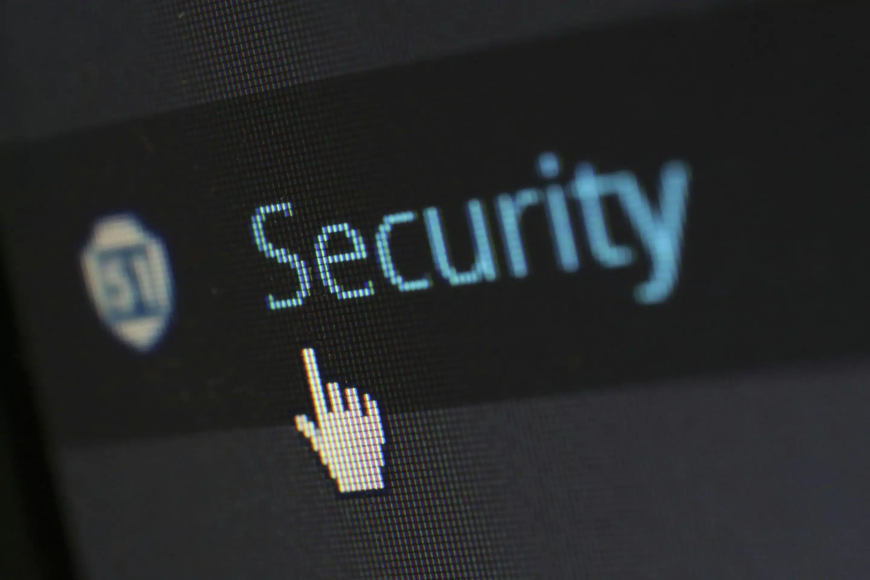 The Change Healthcare Cyber Attack: What’s Going On? A mouse pointer on a computer screen hovering above a button that says "security."